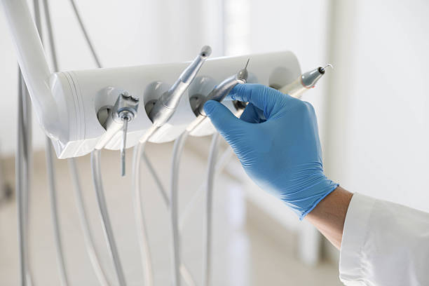 Professional Invisalign Clear Aligners technician working in Fayetteville, AR